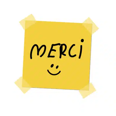 Un post-it avec écrit "Merci" et un smiley :)